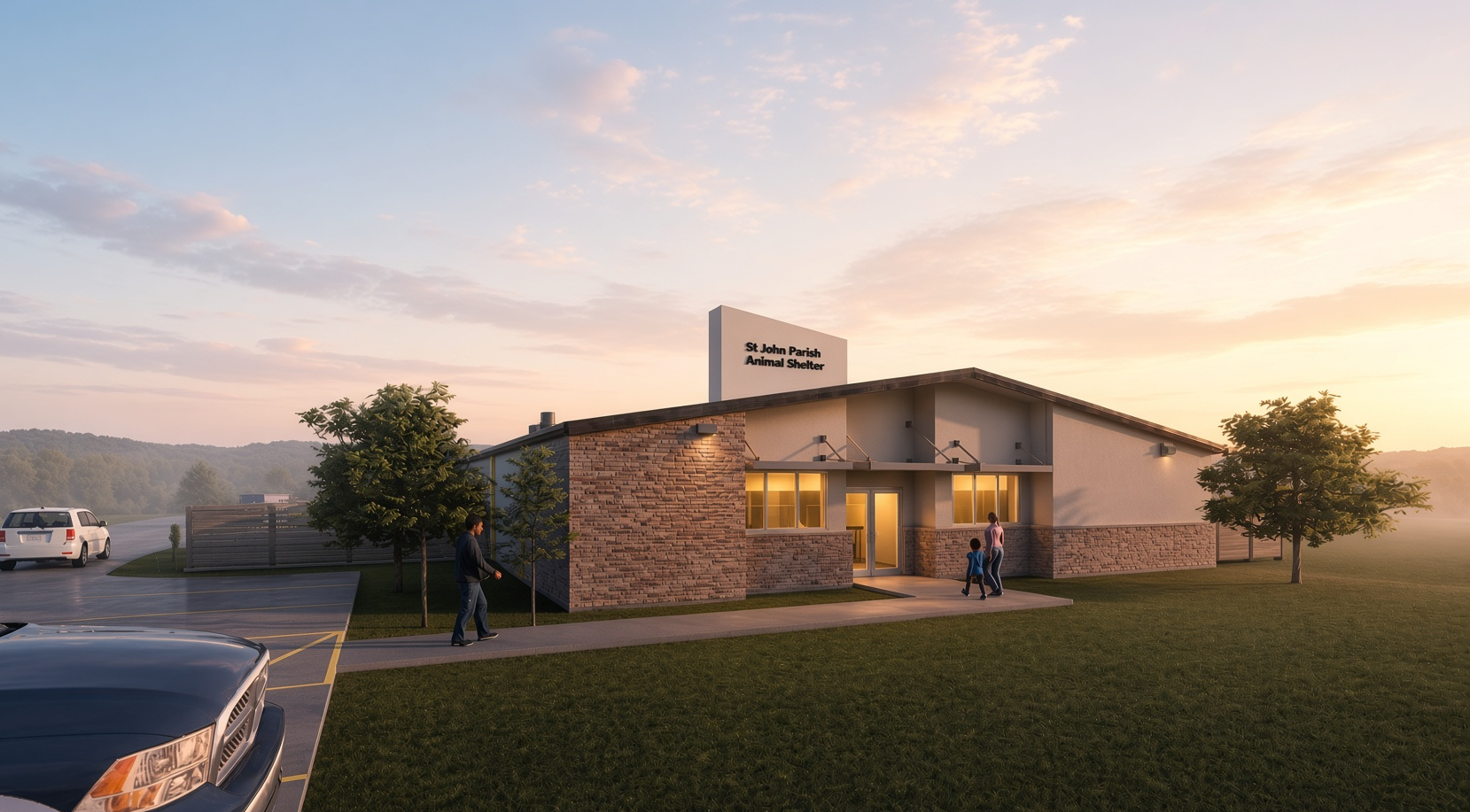 Animal shelter building at sunset with a few people walking toward the entrance and cars in the parking lot.